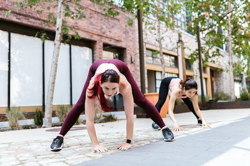 2 women learning Reasons Why You Should Incorporate Pre-workouts in Your Training Routine